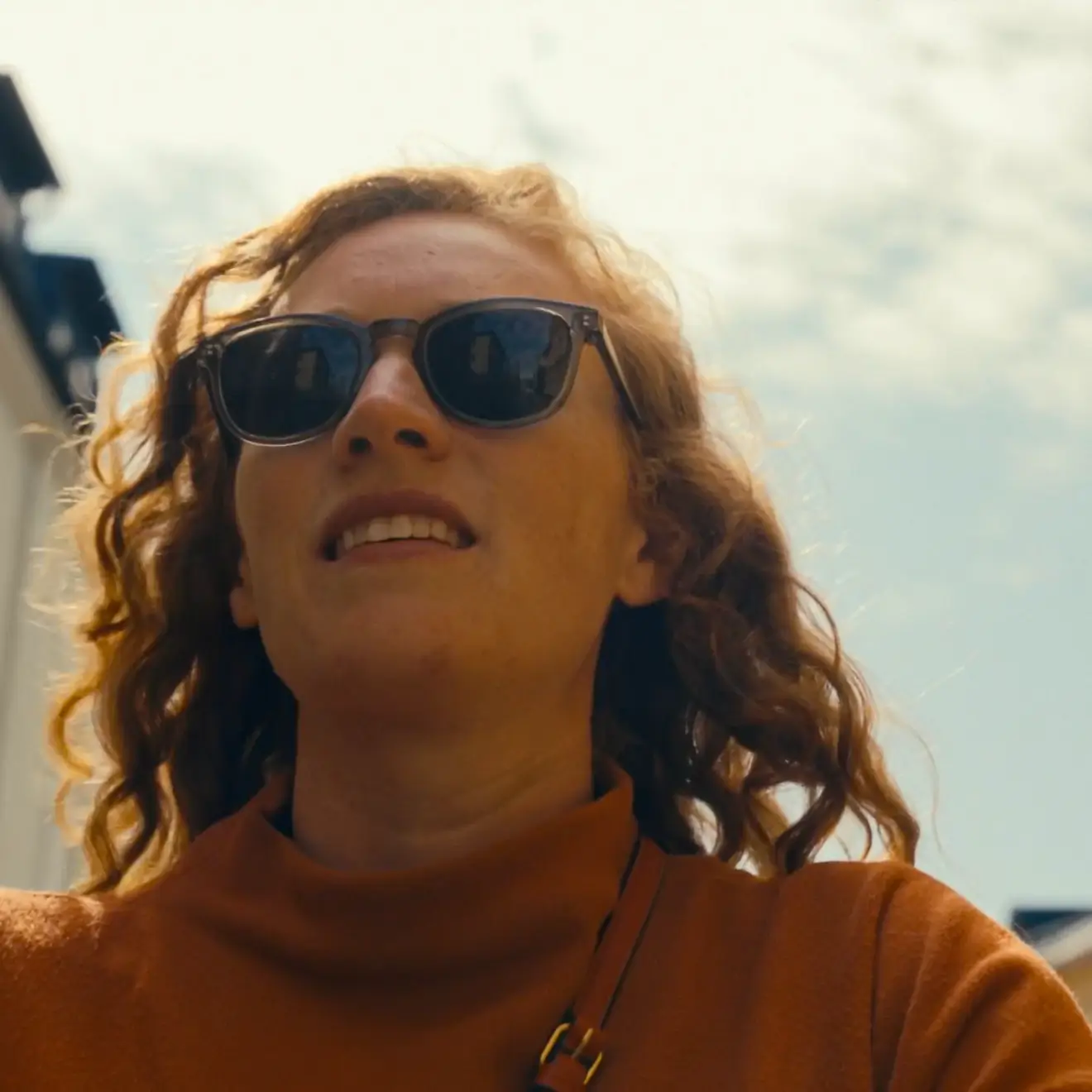 A woman smiling
