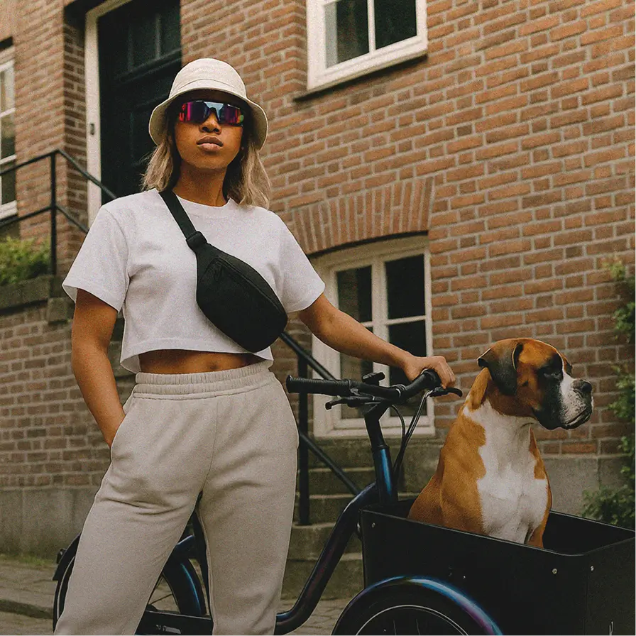 girl with a cargobike and a dog