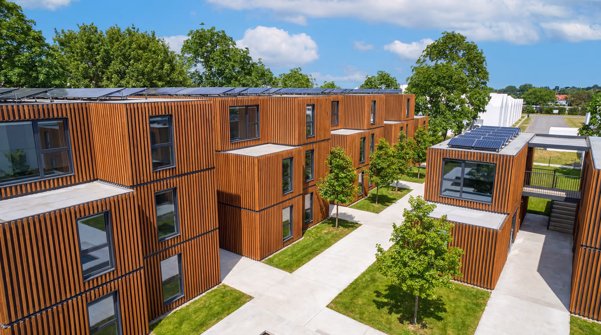 Boost Two-story unit western red cedar cladding