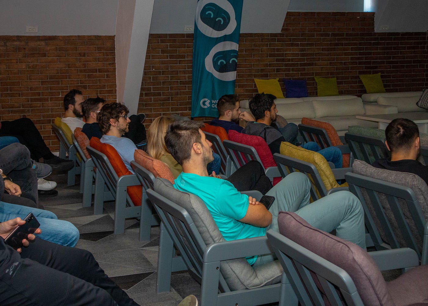 Colleagues attentively listening during a meeting