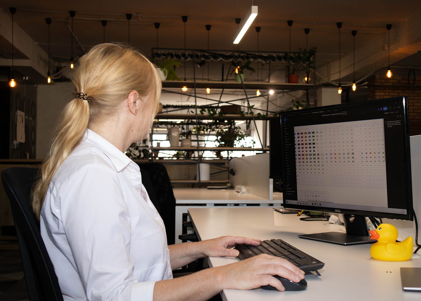 Woman focused on tasks while working in the office