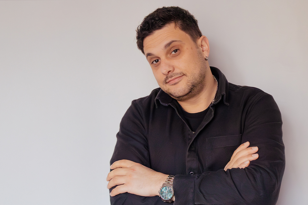 Employee smiling for a portrait-style photo 