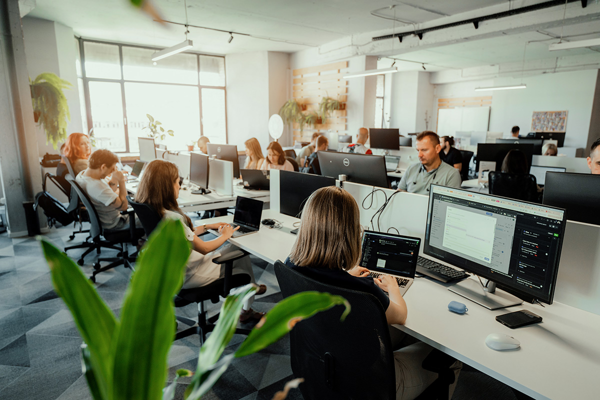 Team collaborating in a modern office environment.