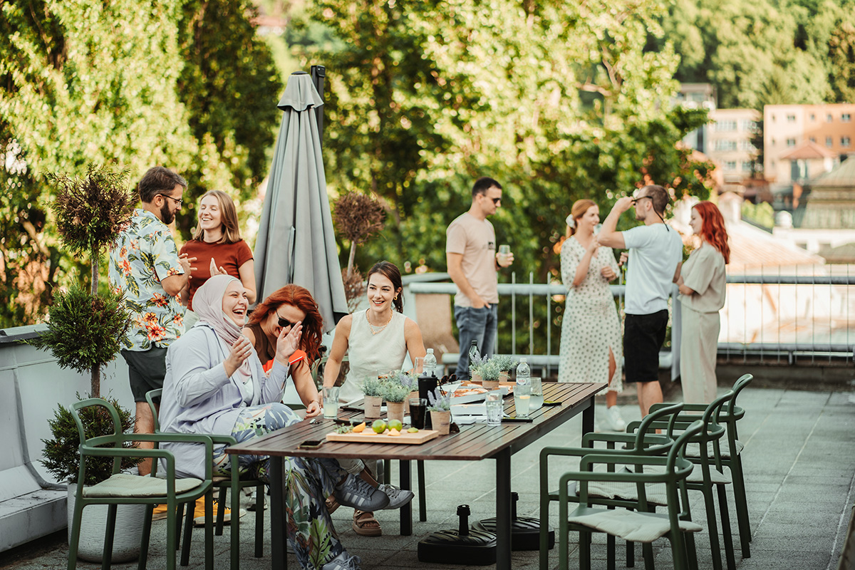 Employees relaxing on a terrace during a break