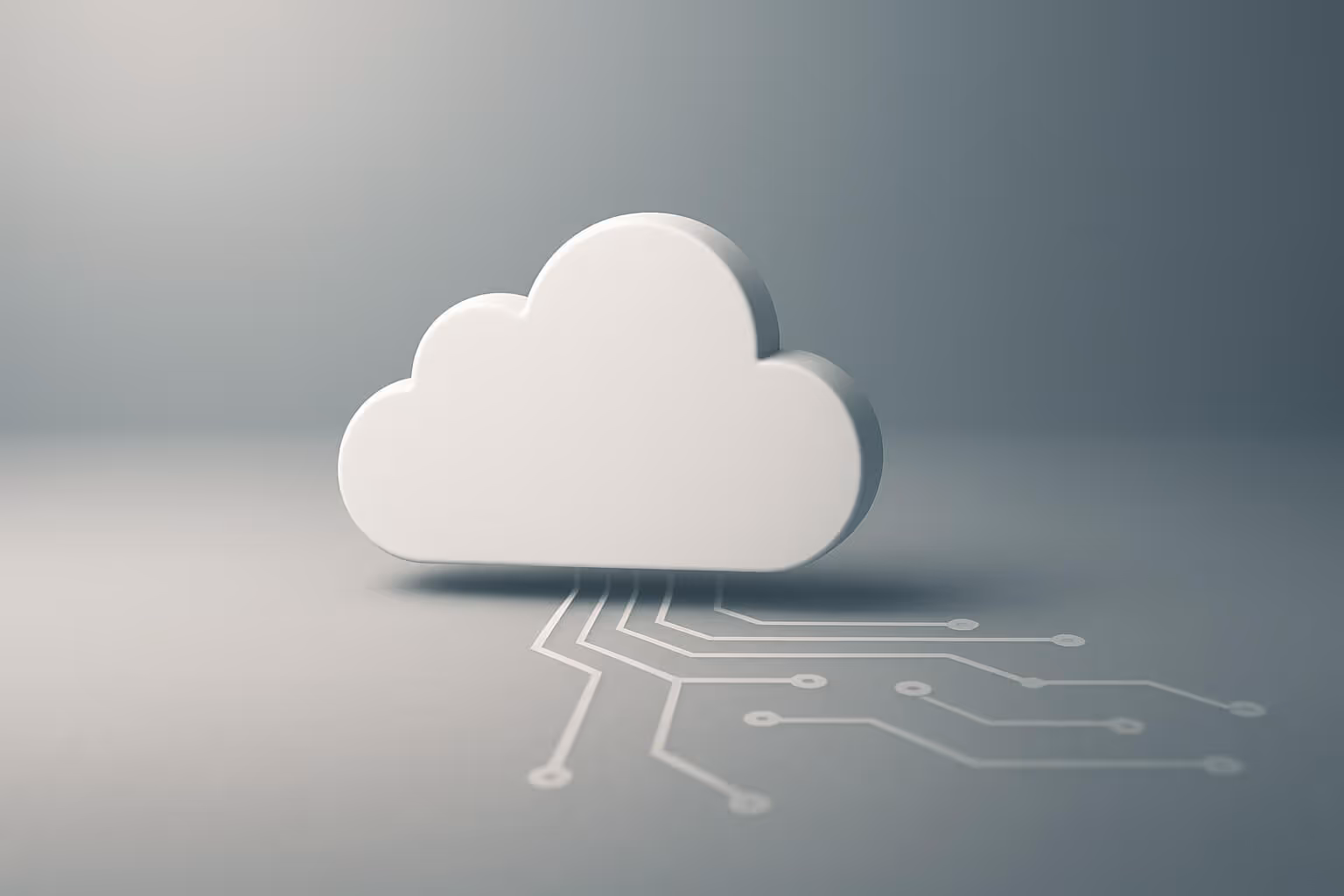 A white cloud-shaped object with circuit lines extending from its base on a gray background.