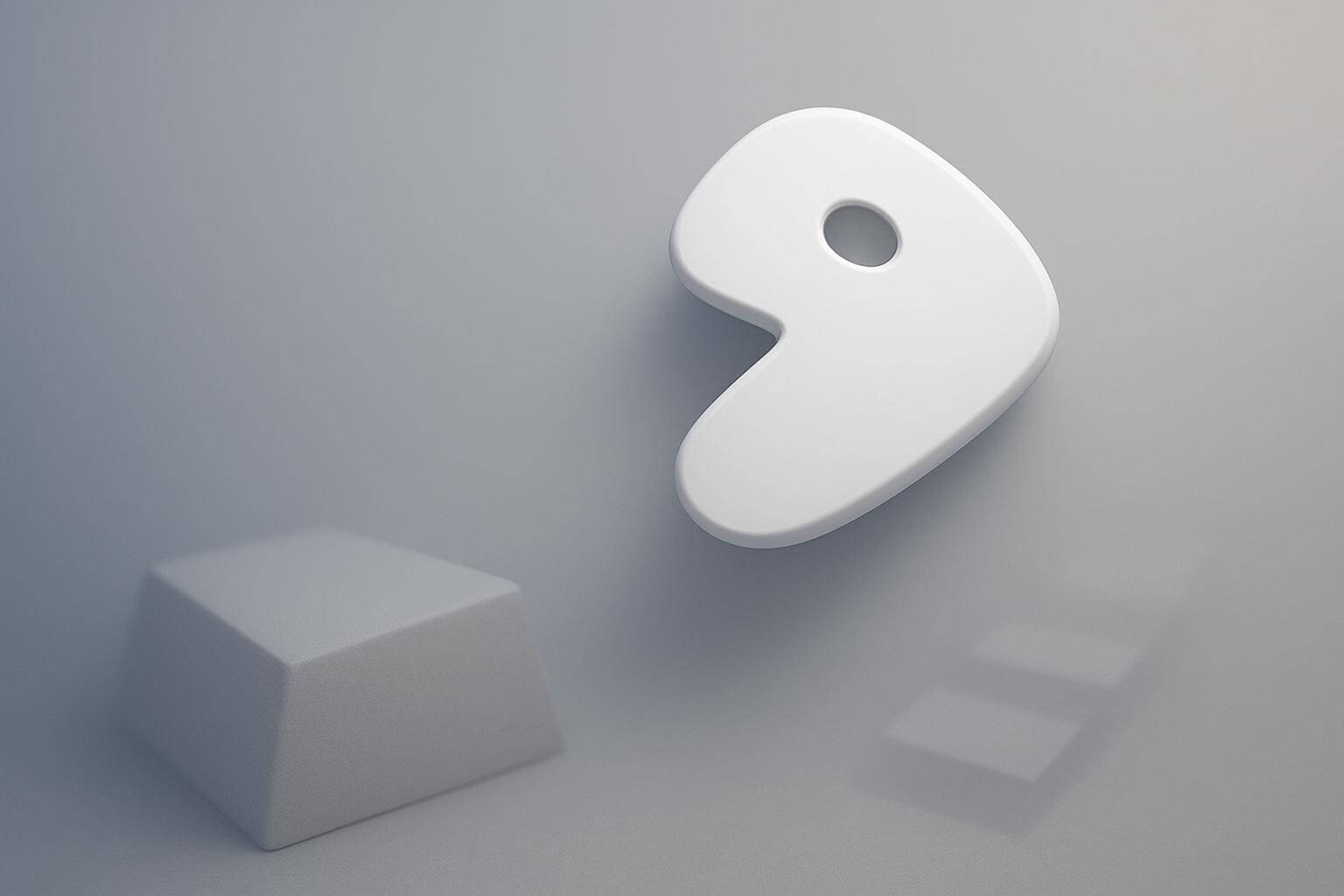 A white, abstract, rounded shape with a hole near the top is floating above a gray, rectangular object on a plain background.