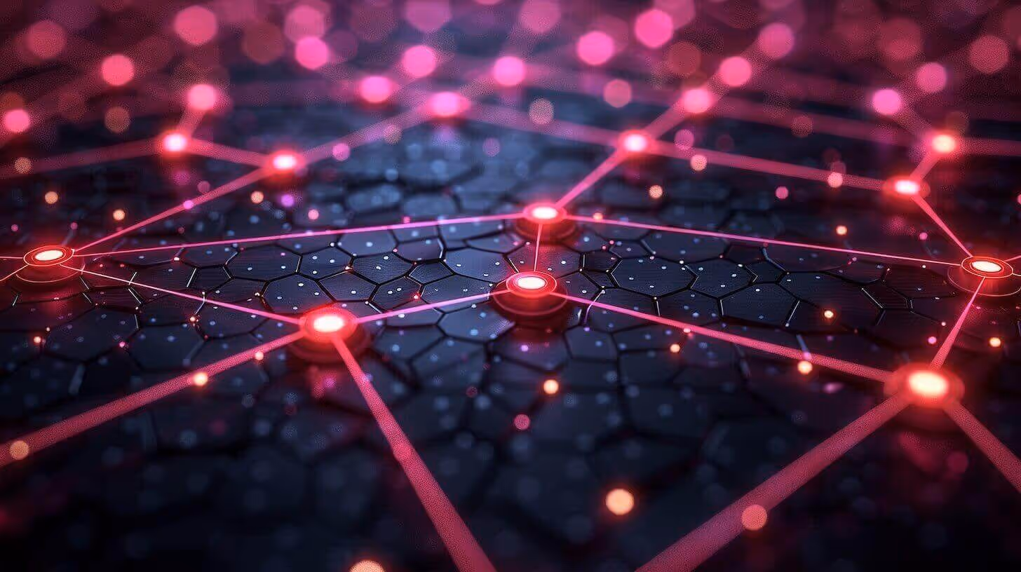 Glowing pink lines connect bright circular nodes across a dark, hexagonal patterned surface.