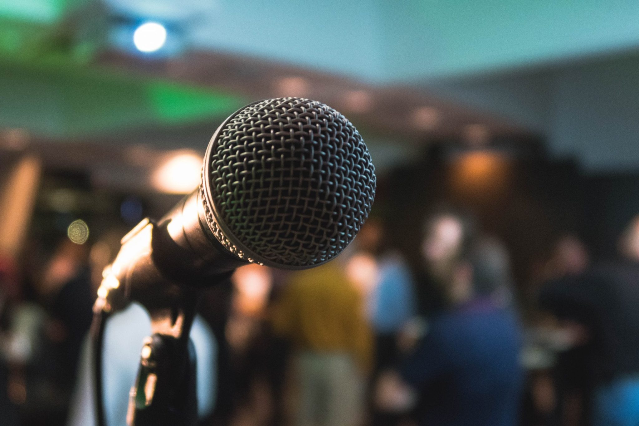 Close-up of a microphone with a blurred background 