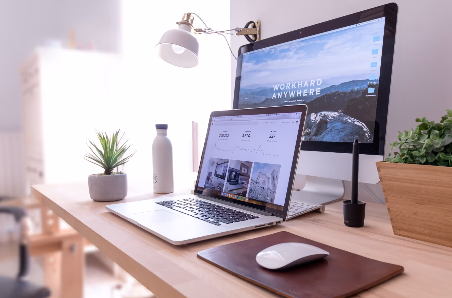 Minimalist home office desk with laptop showing analytics