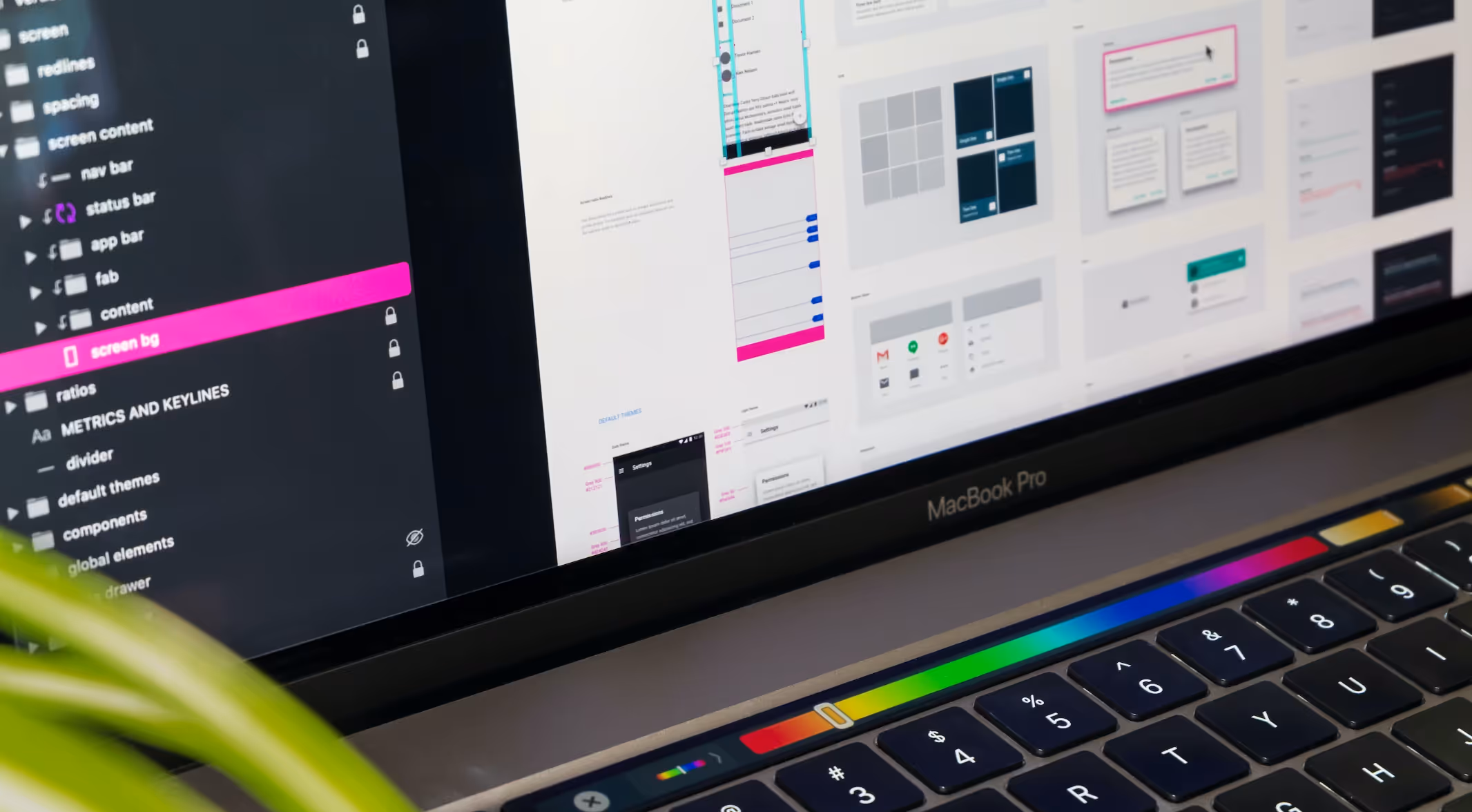 Design software on MacBook with graphics and layout preview