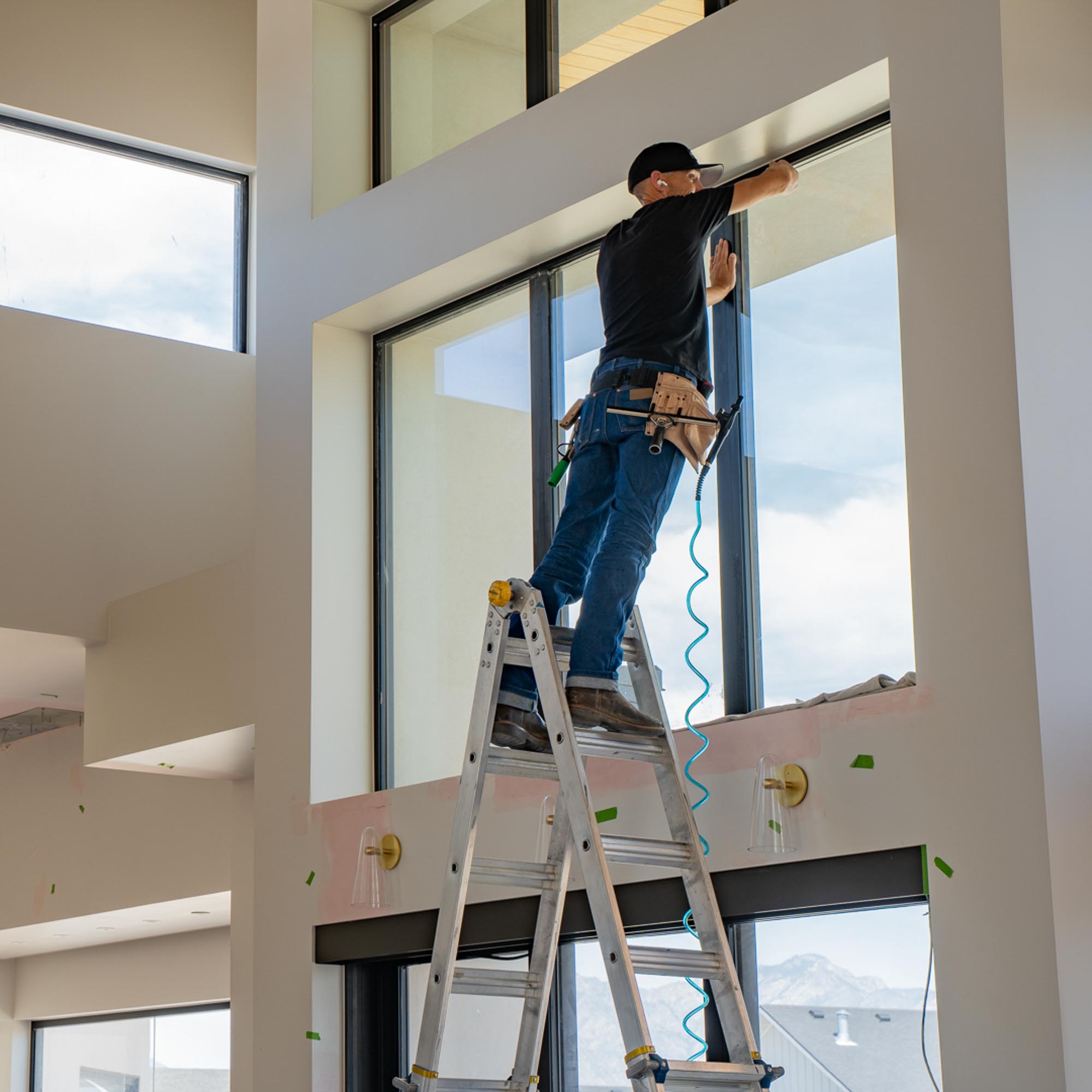 Custom home in Sandy, Utah with large modern windows prepared for residential window film installation