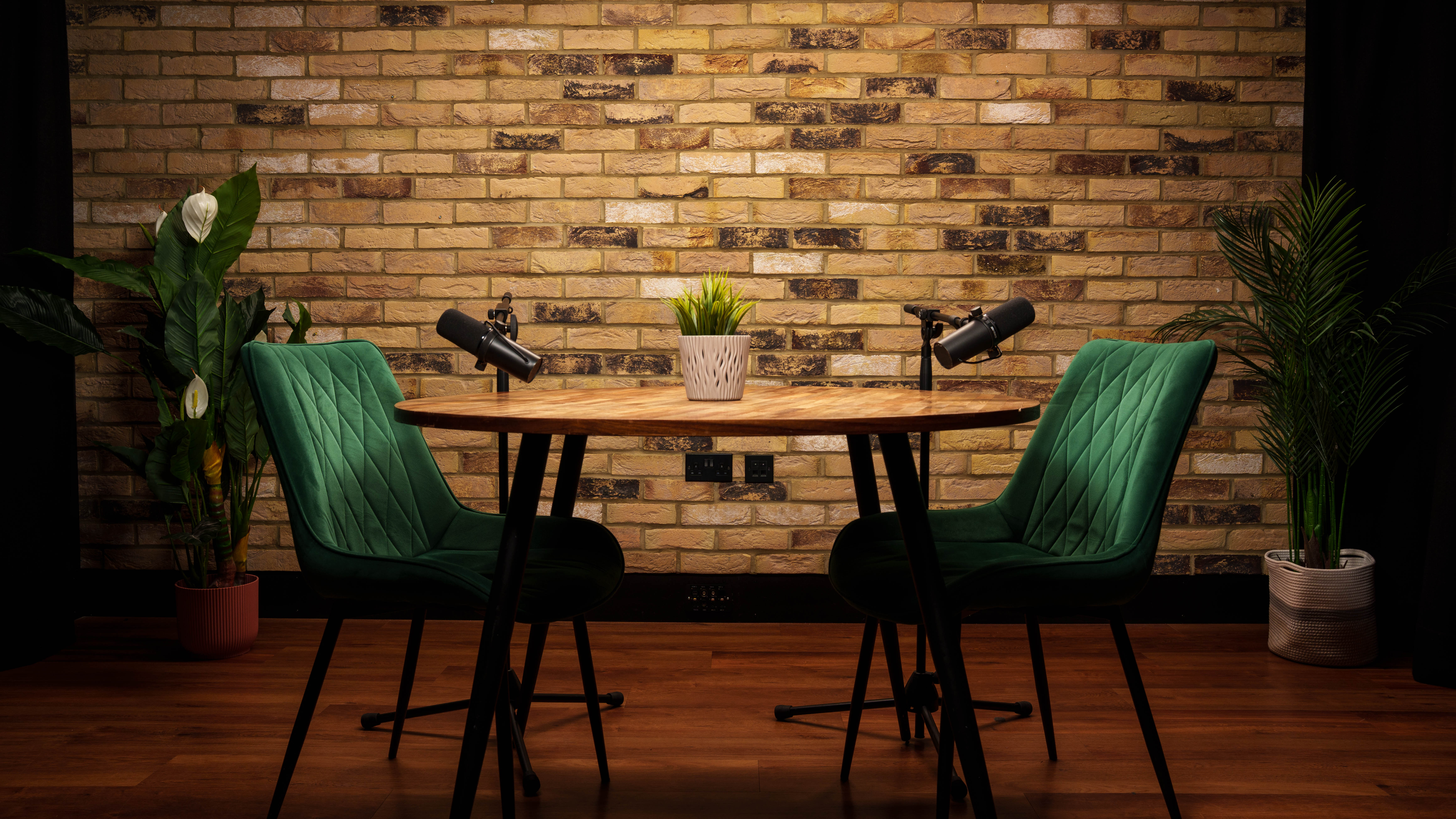 The Founder set, green chairs at round table