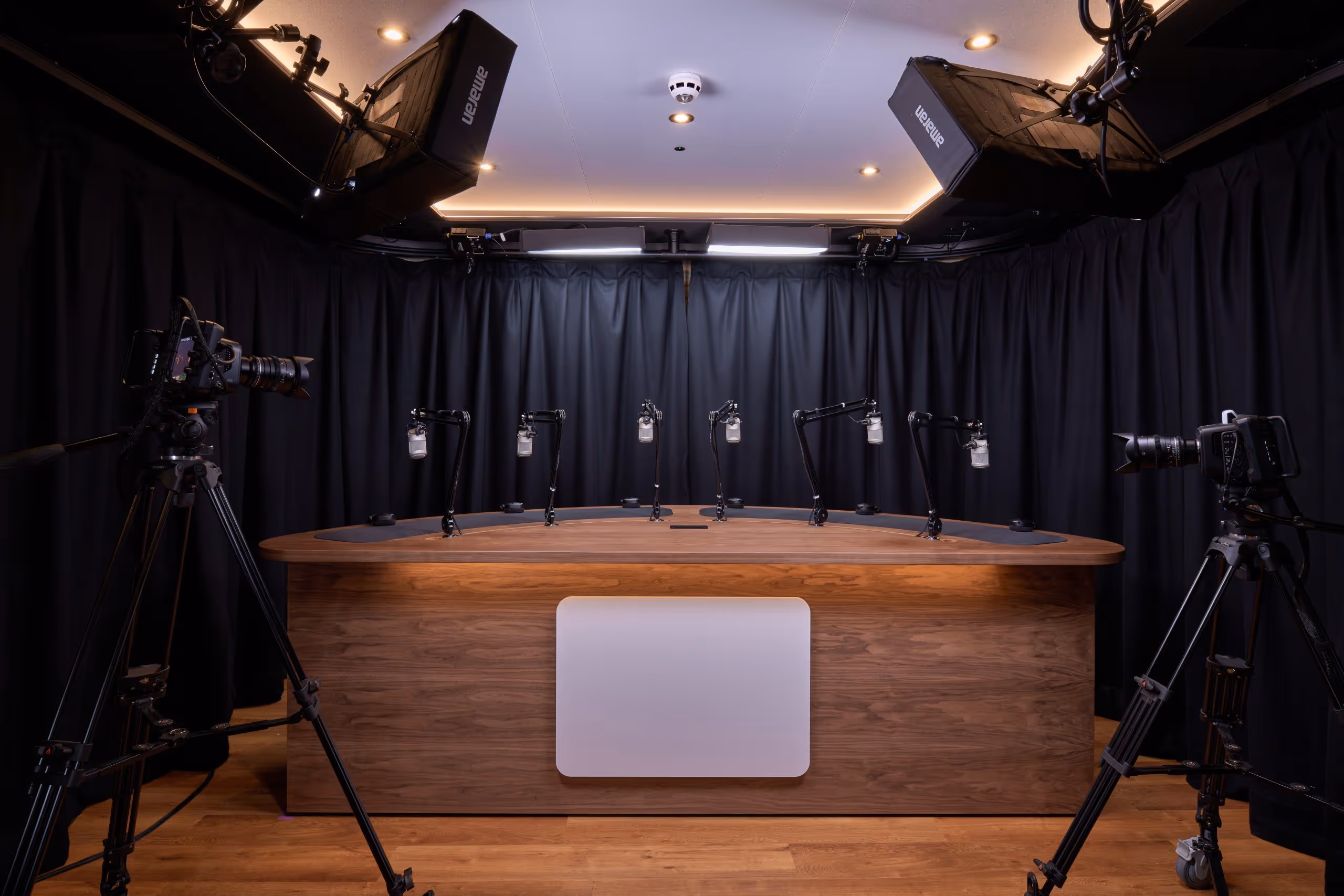 professional podcast studio row of mics