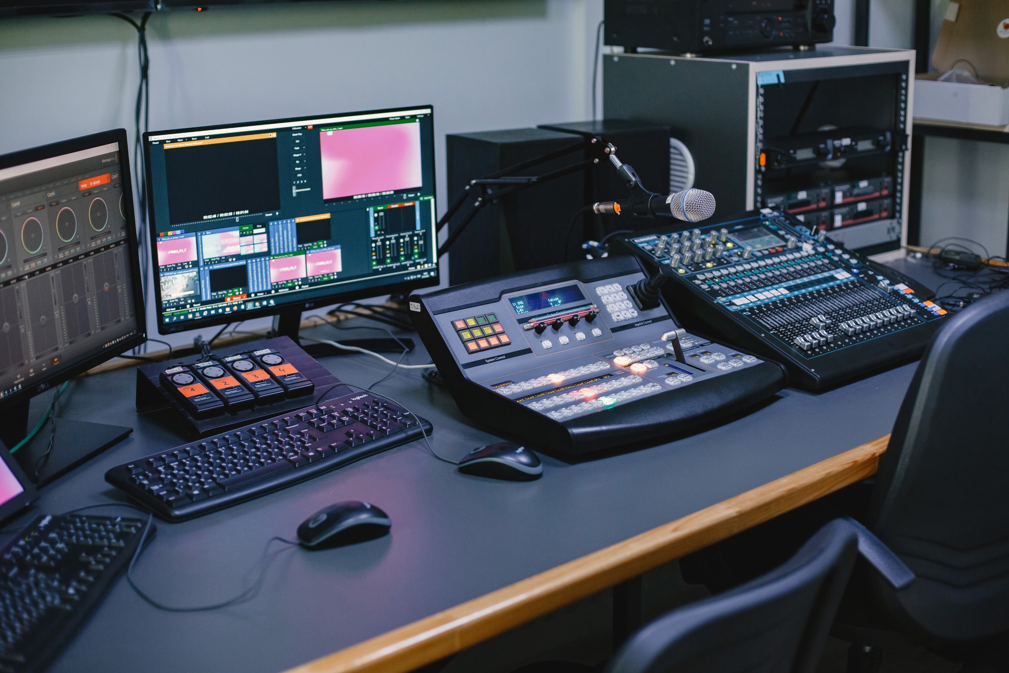 studio mixing desk with equipment