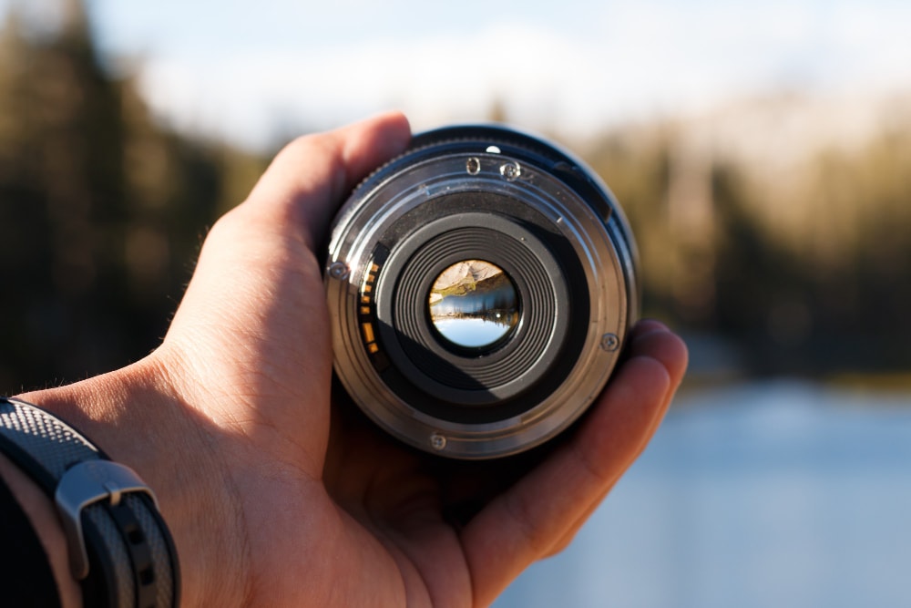 Reflection on steel machinery with camera lens generated by ai