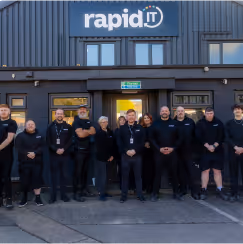 The Rapid IT Team outside the company headquarters in Padiham, Lancashire