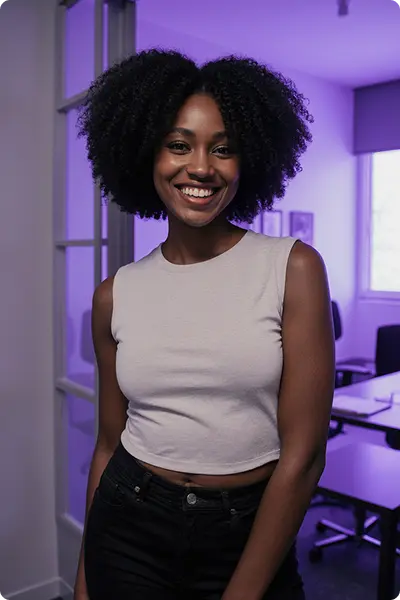 Photo of a candidate. Young african american woman, smiling and wearing light top.
