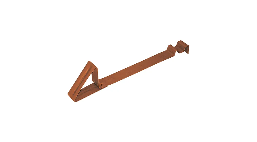 a brown metal object with a white background