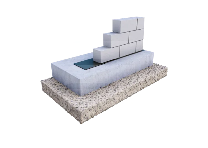 a white brick on a piece of concrete