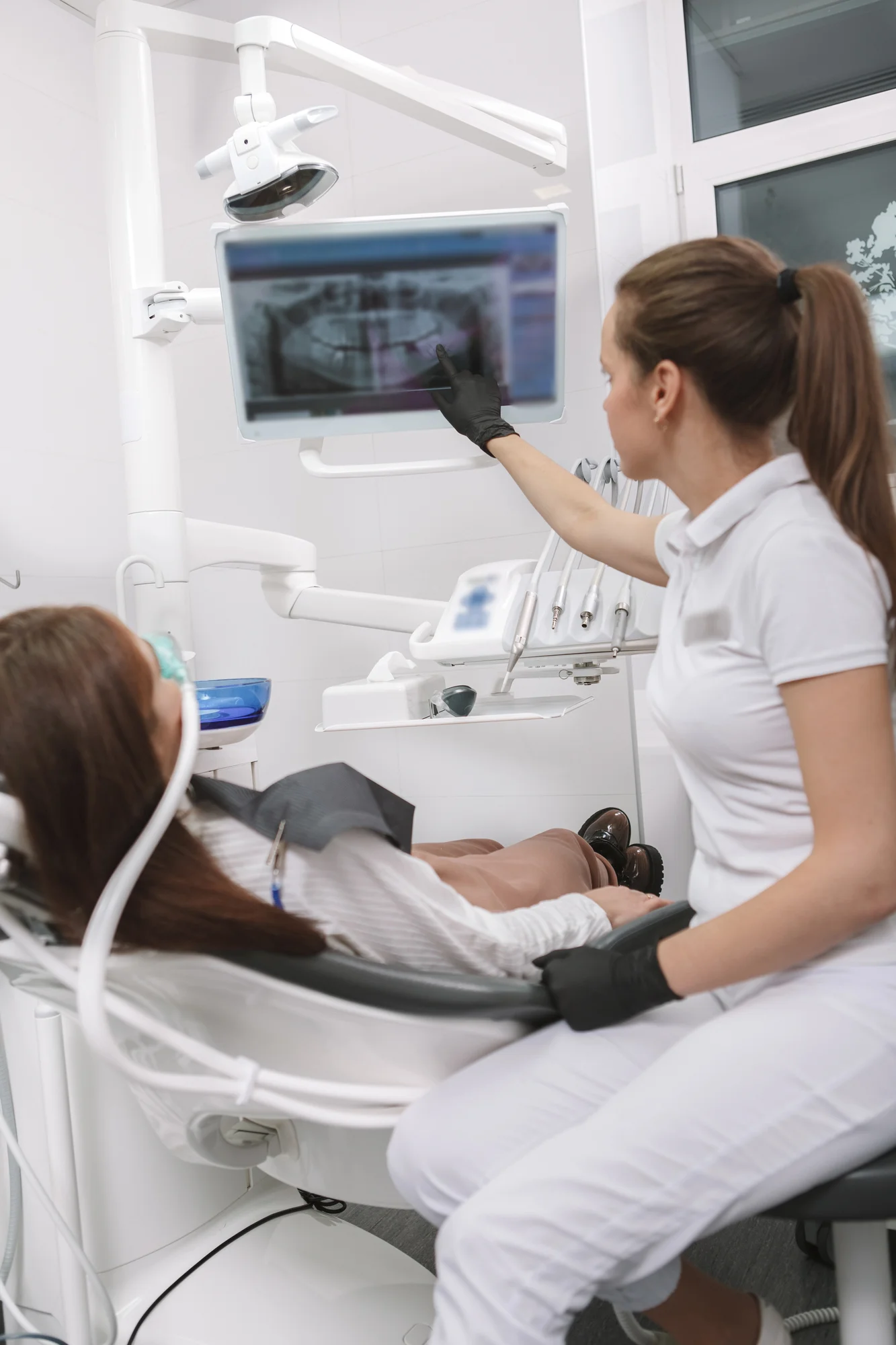 Dentist in Spartanburg, SC reviewing dental X-rays