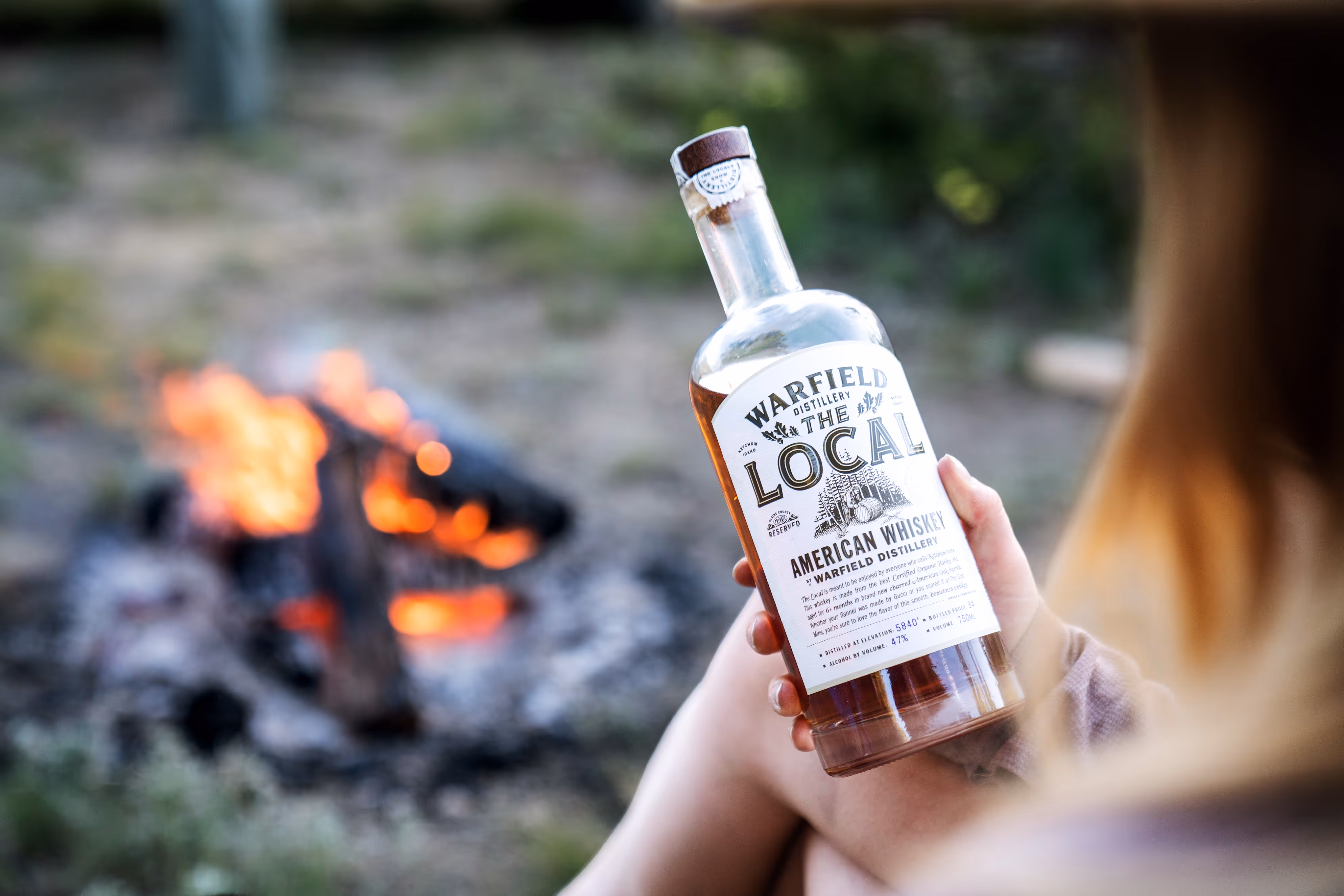 Whiskey Bottle on wood