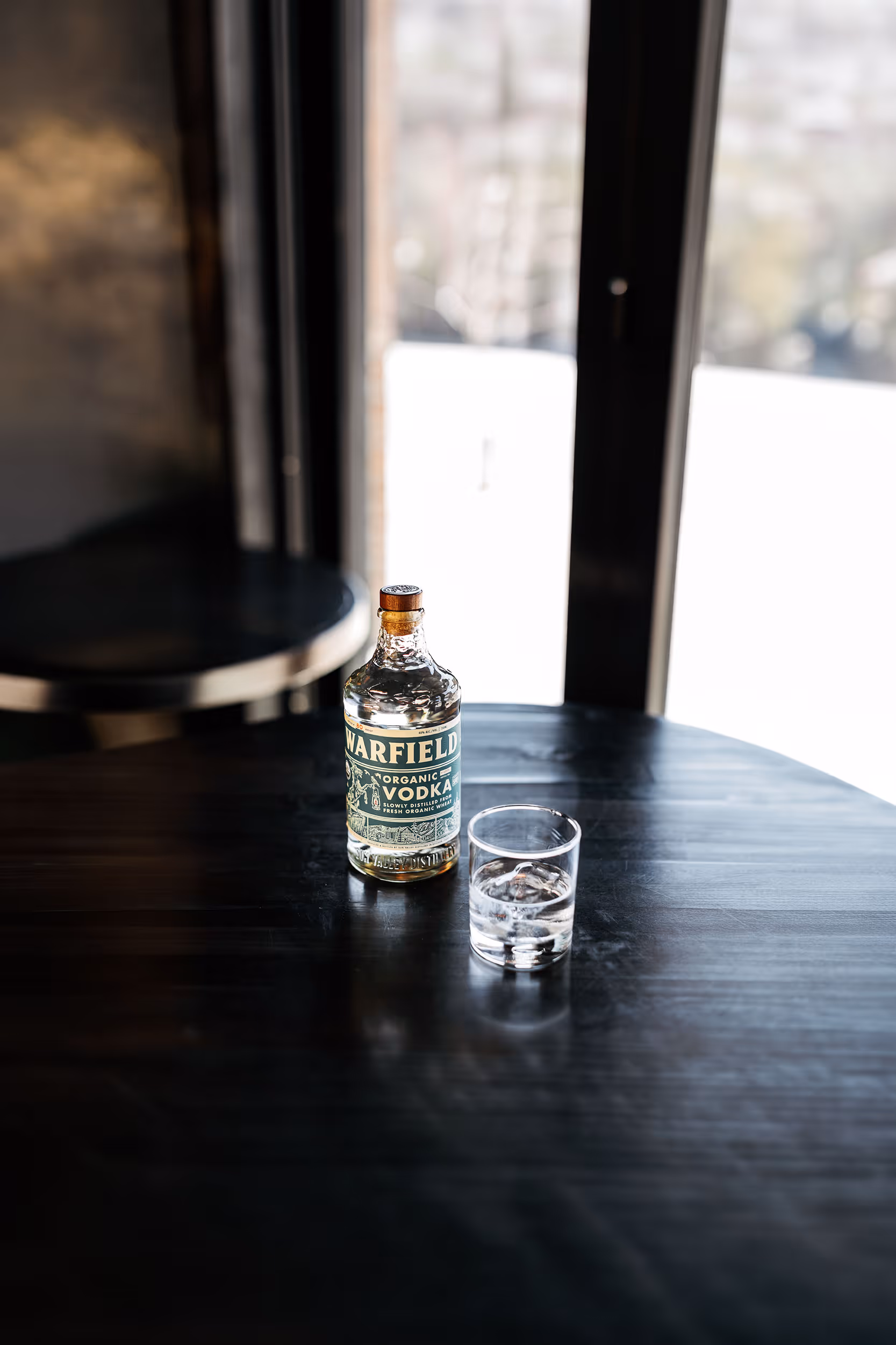 Whiskey Bottle on wood