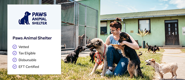 A woman sits on the grass outside an animal shelter, happily surrounded by several dogs. A sign reads Paws Animal Shelter with icons listing: vetted, tax eligible, disbursable, and EFT certified.