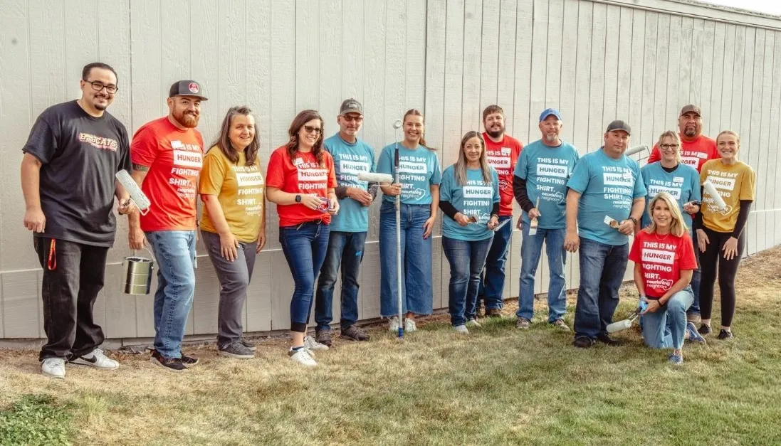 Group of Albertson employees volunteering.