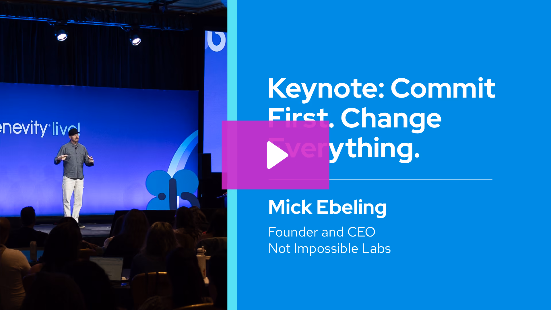 Mick Ebeling speaking on stage at a conference with a blue background and presentation title on screen.