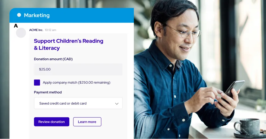 A man wearing glasses and a blue shirt is smiling while using a smartphone, sitting at a table next to a window with a coffee cup nearby. On the left, a digital interface shows a donation form titled 'Support Children’s Reading & Literacy' for ACME Inc. in the Marketing section, with a $25 CAD donation, an option to apply a company match, payment method selection, and buttons for reviewing donation or learning more.