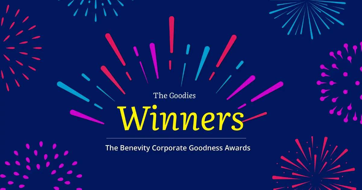 Dark blue background with colorful fireworks and bursts. In the center, white and yellow text reads: The Goodies Winners. The Benevity Corporate Goodness Awards.