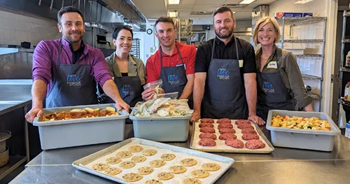 Reliance employees volunteering and donating.