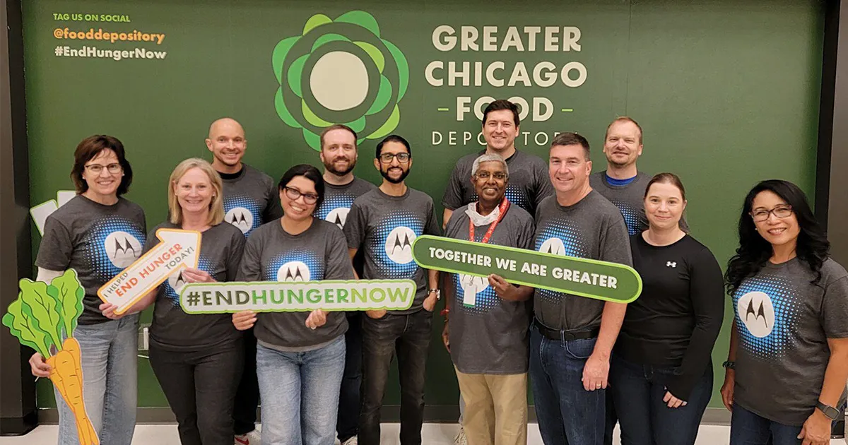 Motorola Solutions employees volunteering at Greater Chicago Food Depository to end hunger.