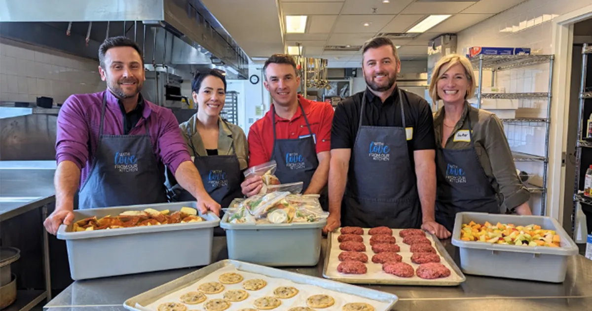 Reliance employees volunteering and donating.