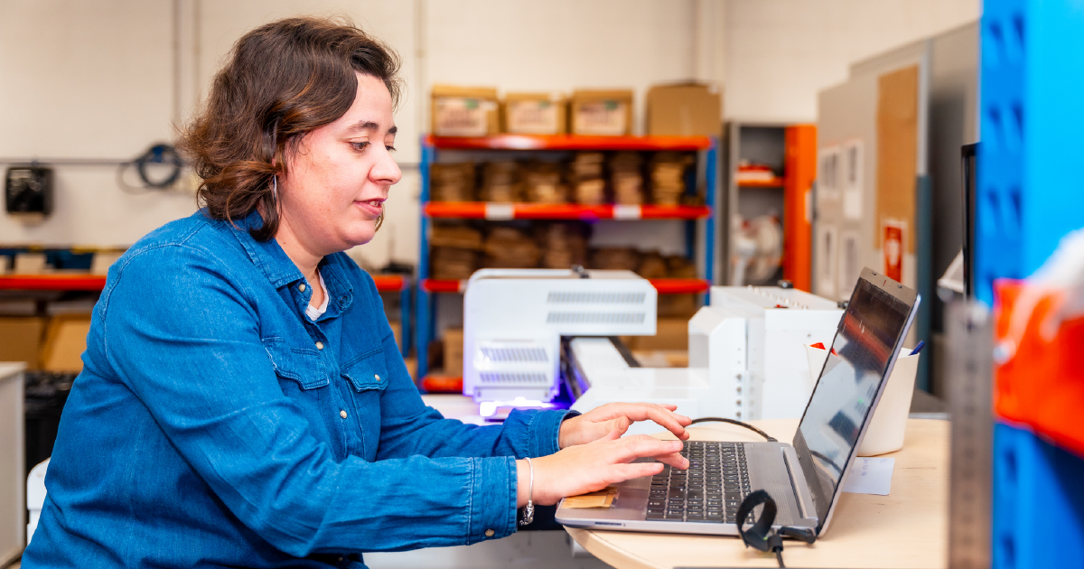 CSR professional working at computer