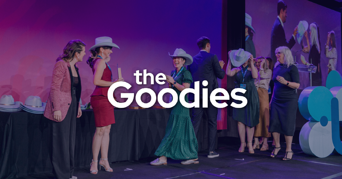 Image of a past winner accepting their Goodies award