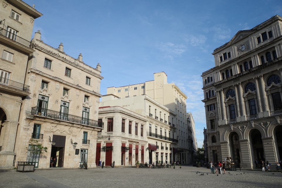 Plaza de San Francisco de Asís in Old Havana, Cuba, featuring historic colonial and neoclassical architecture.