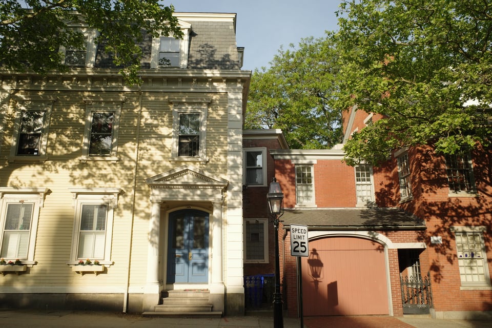 Morning light casts soft shadows on historic houses along Benefit Street in Providence