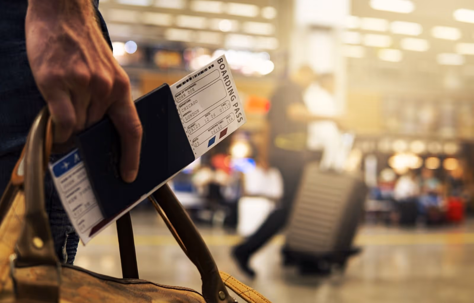 Passanger holding a bag and passport