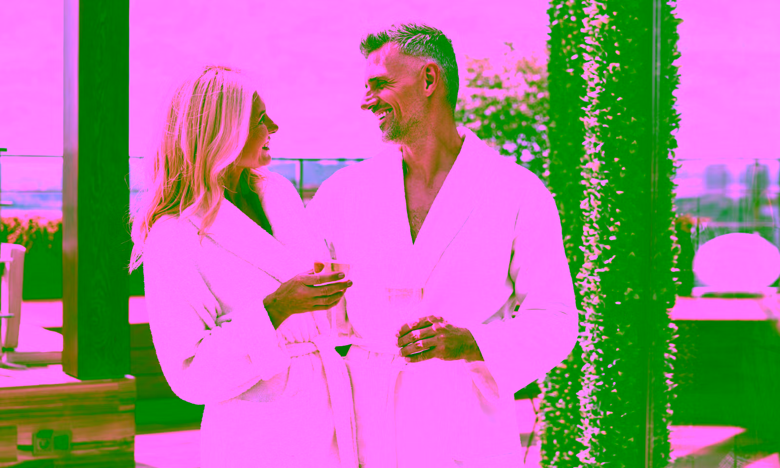 couple smiling at a spa from using resortpass