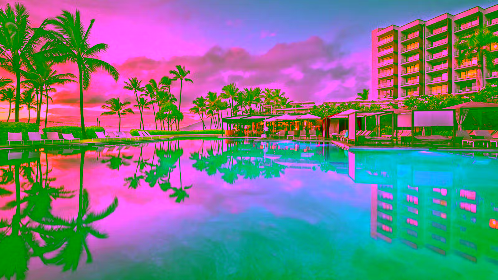hotel pool at sunset