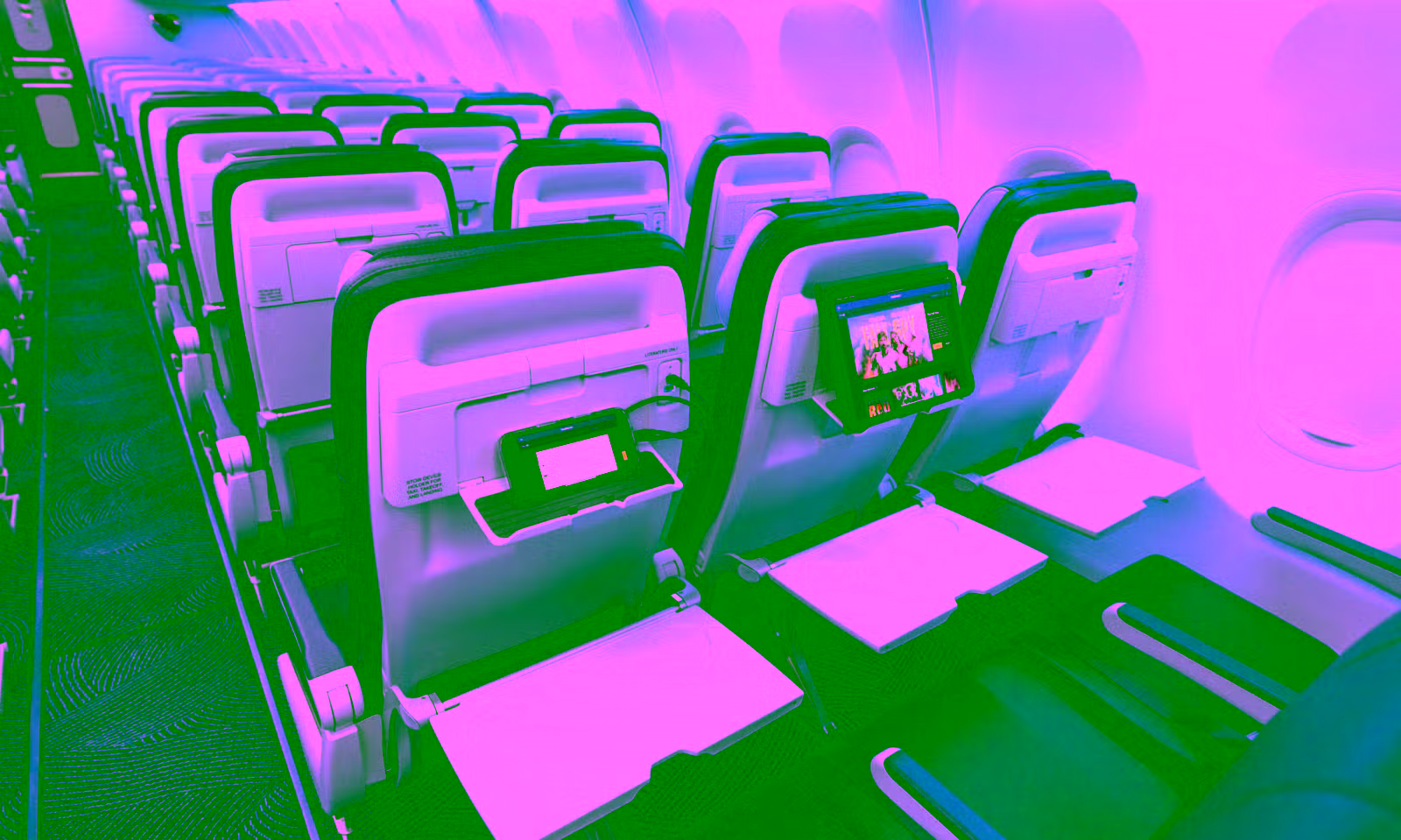 southwest airline plane seats with an ipad