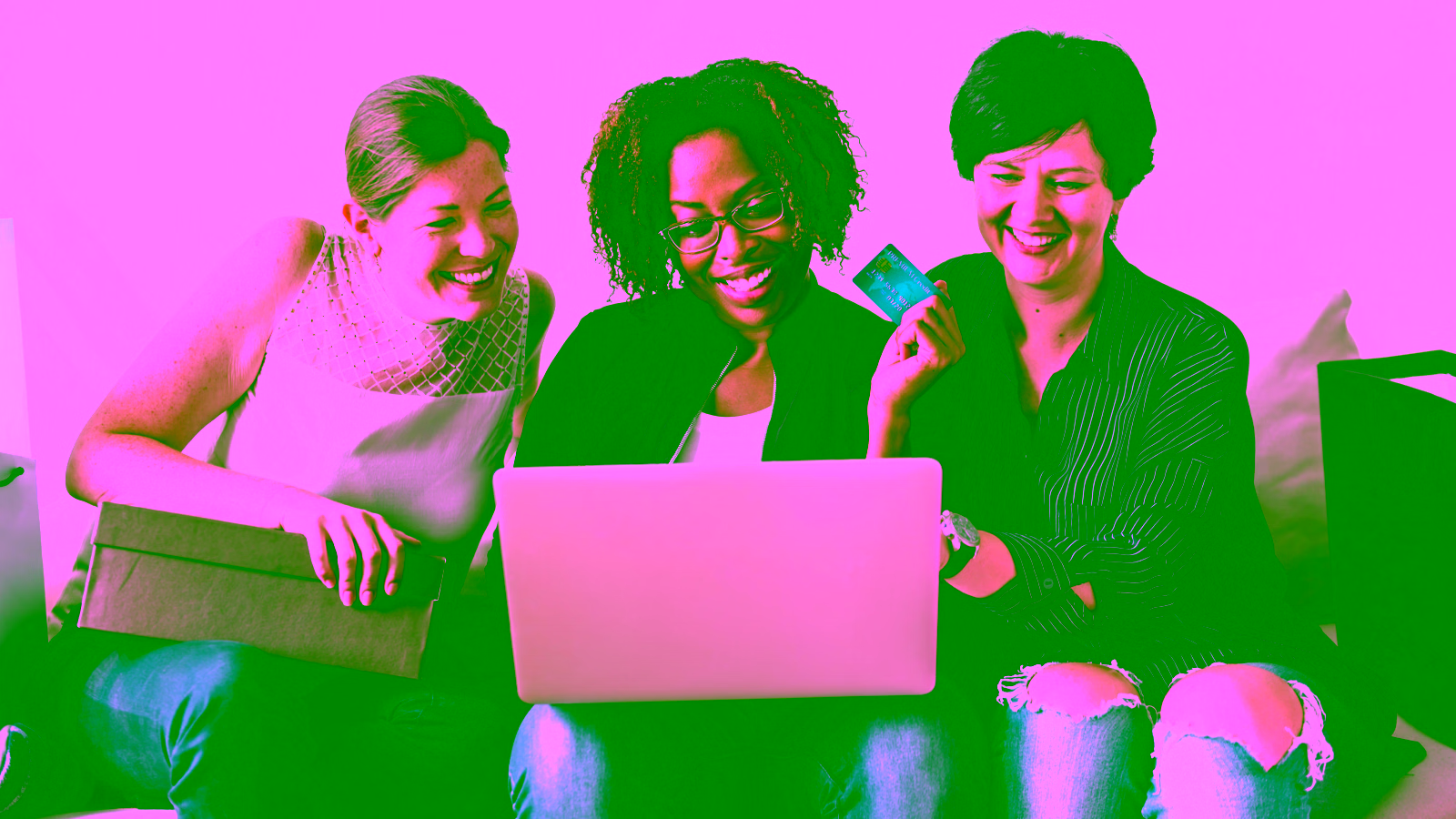 Women shopping online with laptop and card
