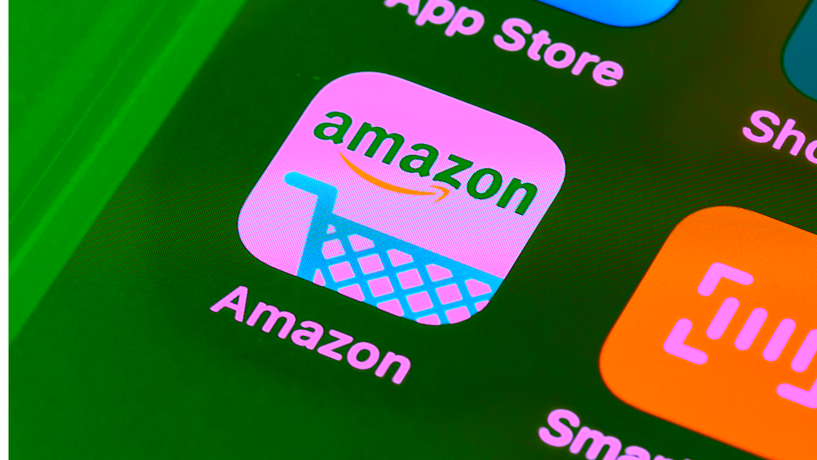 Amazon shopping app icon on phone screen