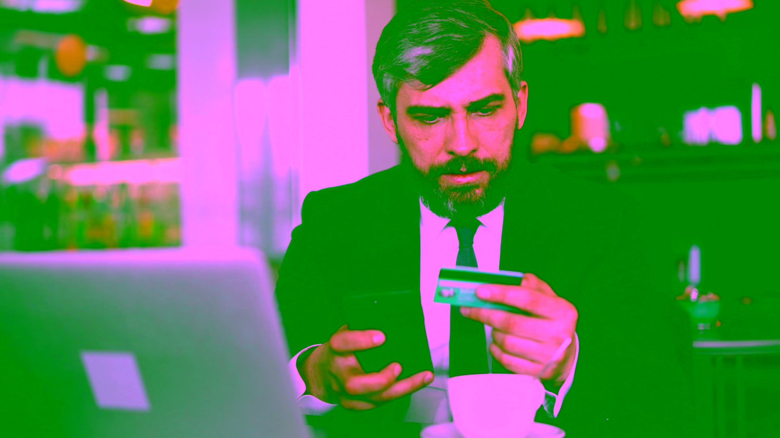 Man using credit card for online payment