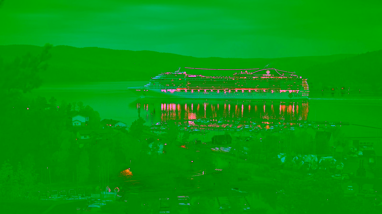 Cruise ship sailing at night