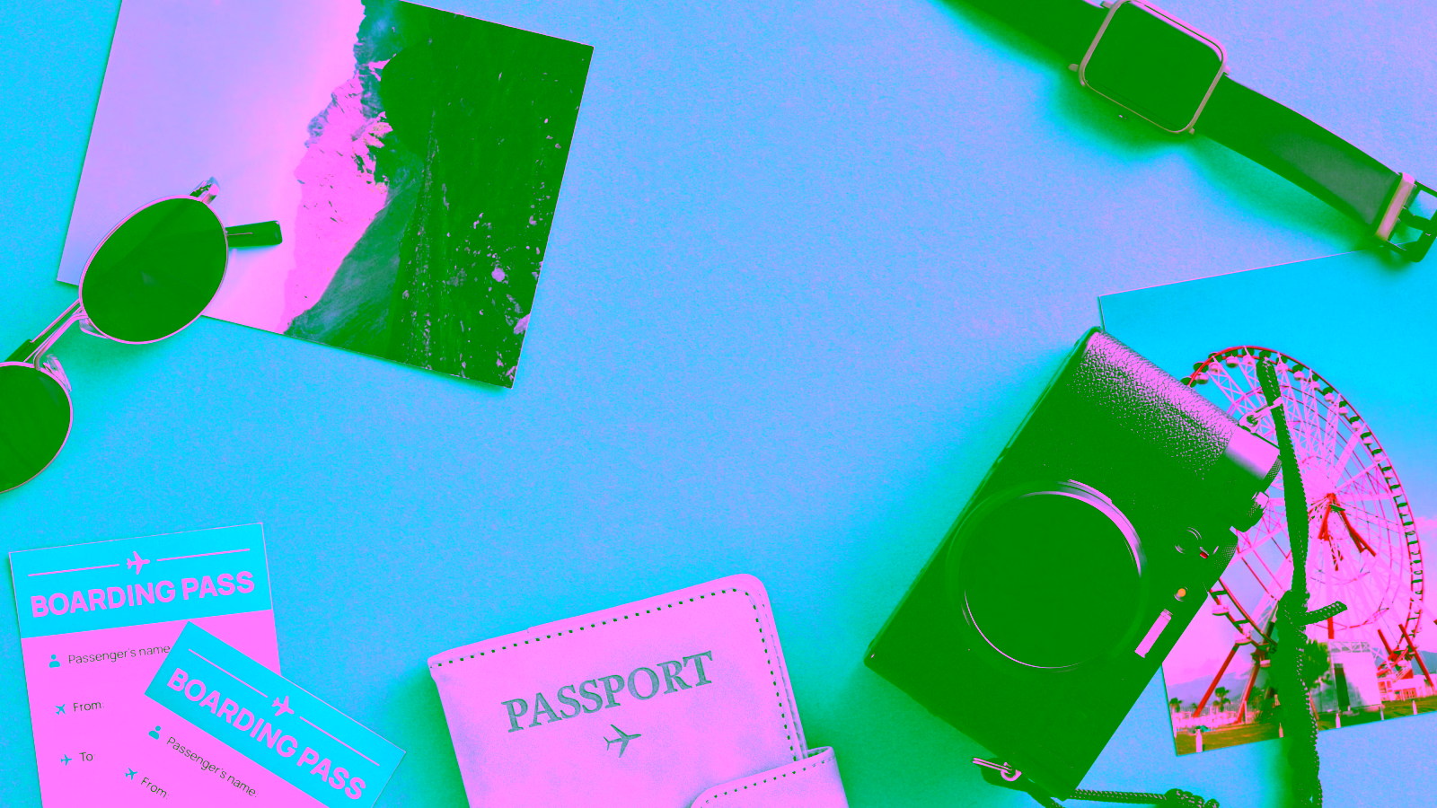 Travel essentials flat lay on blue background