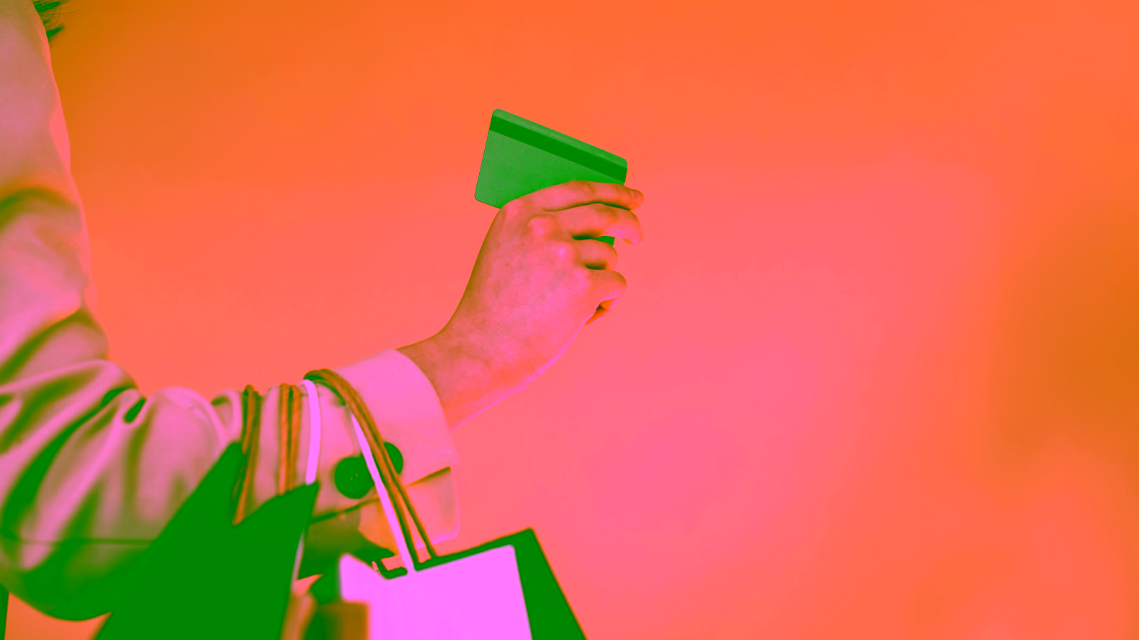 Hand holding a credit card