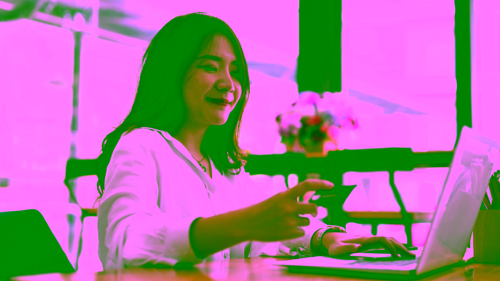 Woman shopping online with credit card