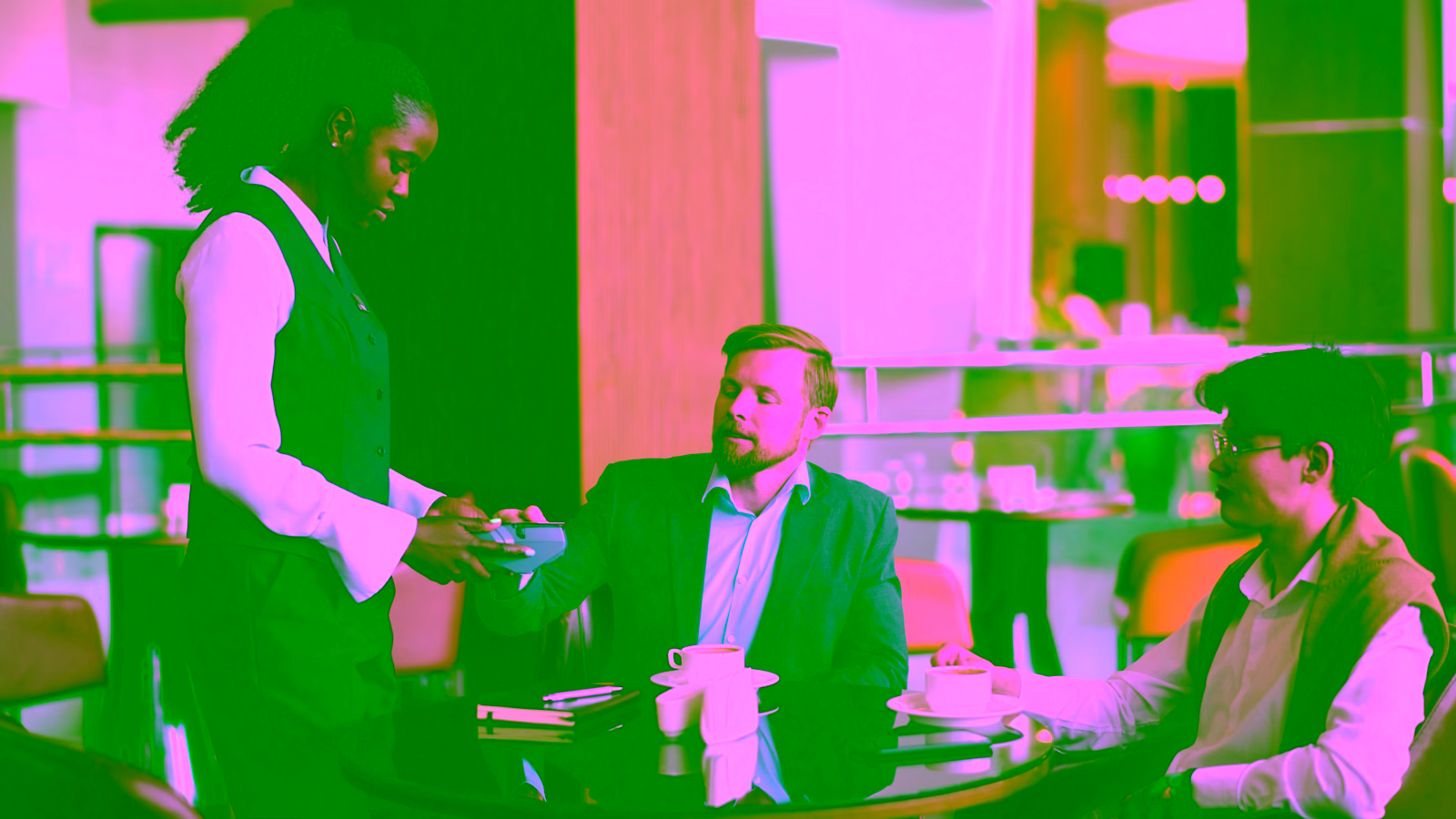 Customer paying with credit card at restaurant